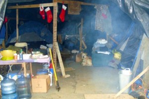 This is a shot of a camp that "housed" several people in Nashville's Tent City that my wife and I visited one Christmas. Every month or two, someone's camp was burnt to the ground for one reason or another.  